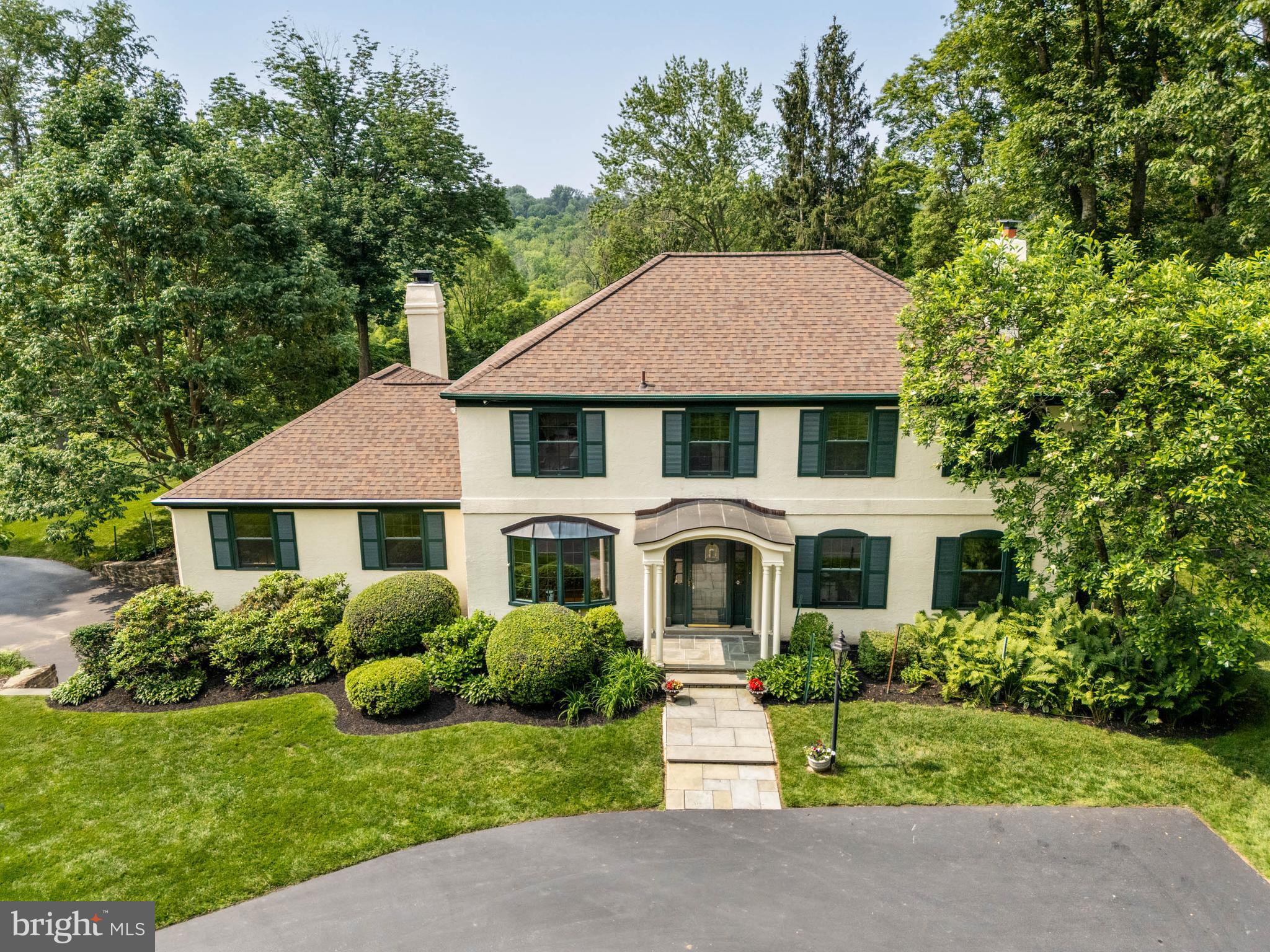 240 Church Road Devon, PA 19333 - Photo 2 of 75 a front view of a house with a yard