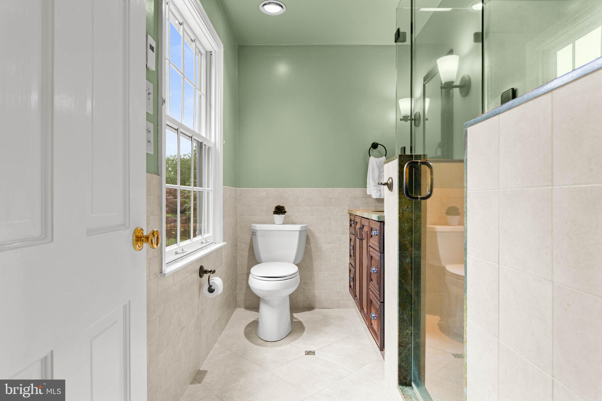 240 Church Road Devon, PA 19333 - Photo 41 of 75 a bathroom with a toilet and a shower