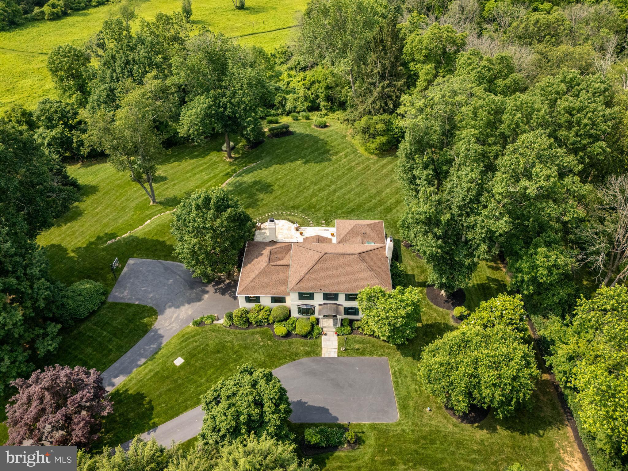 240 Church Road Devon, PA 19333 - Photo 71 of 75 an aerial view of a house with a garden