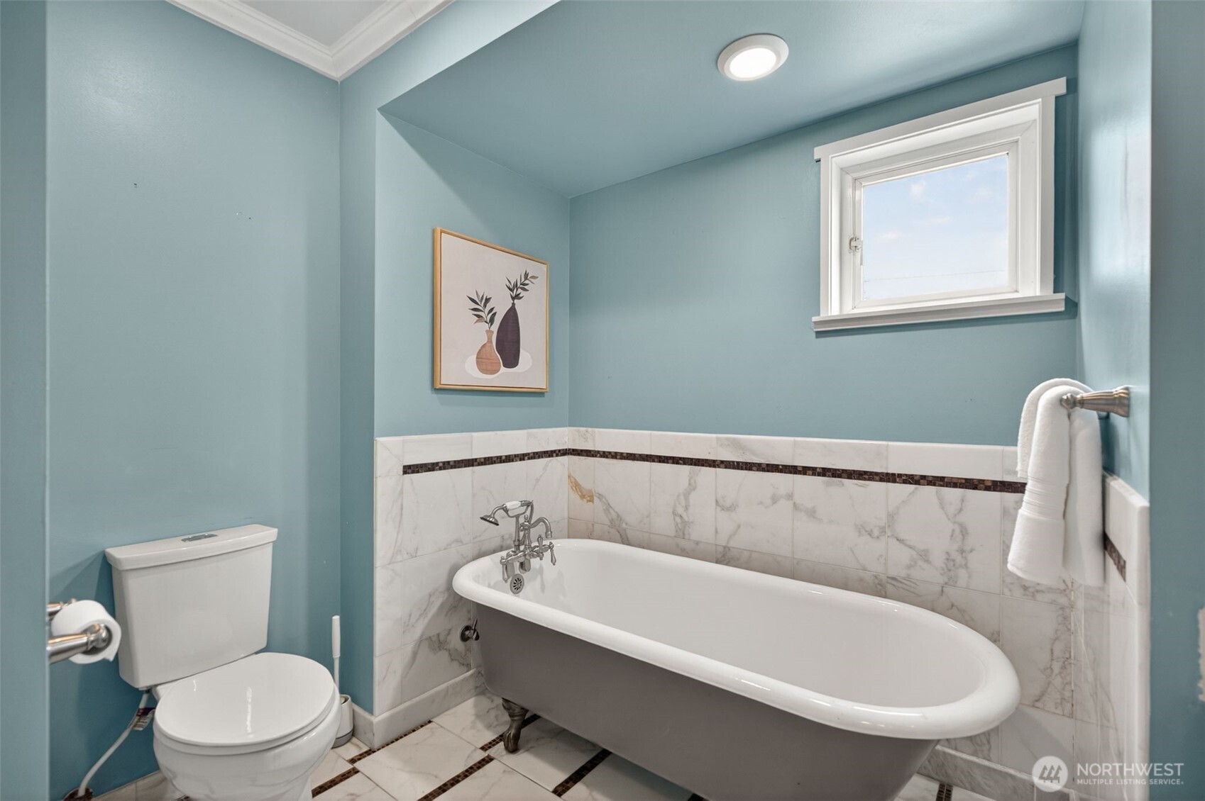 7700 California Avenue Southwest Seattle, WA 98136 - Photo 13 of 40 a white bath tub sitting next to a white toilet