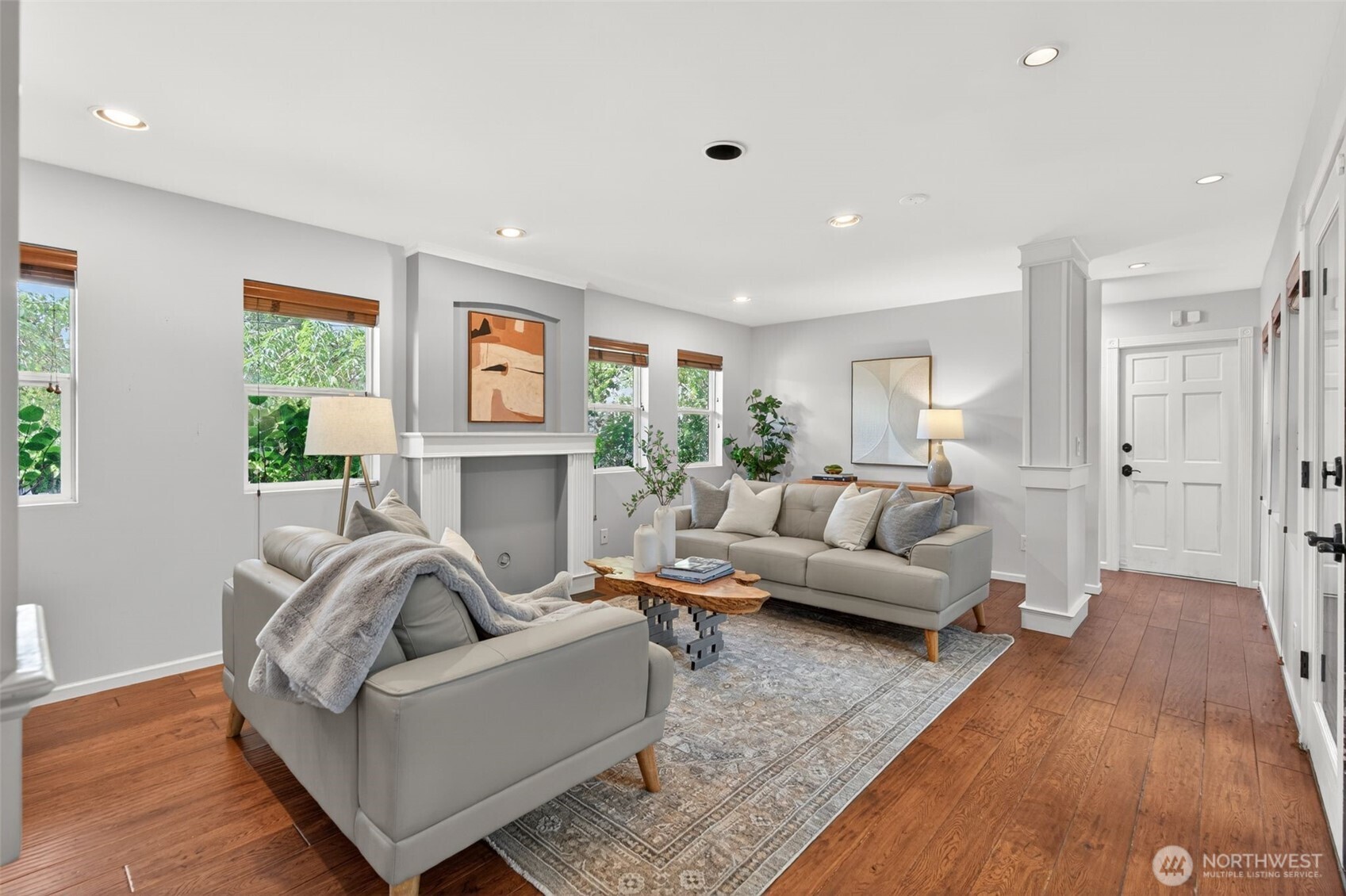 7700 California Avenue Southwest Seattle, WA 98136 - Photo 14 of 40 a living room with furniture and a fireplace