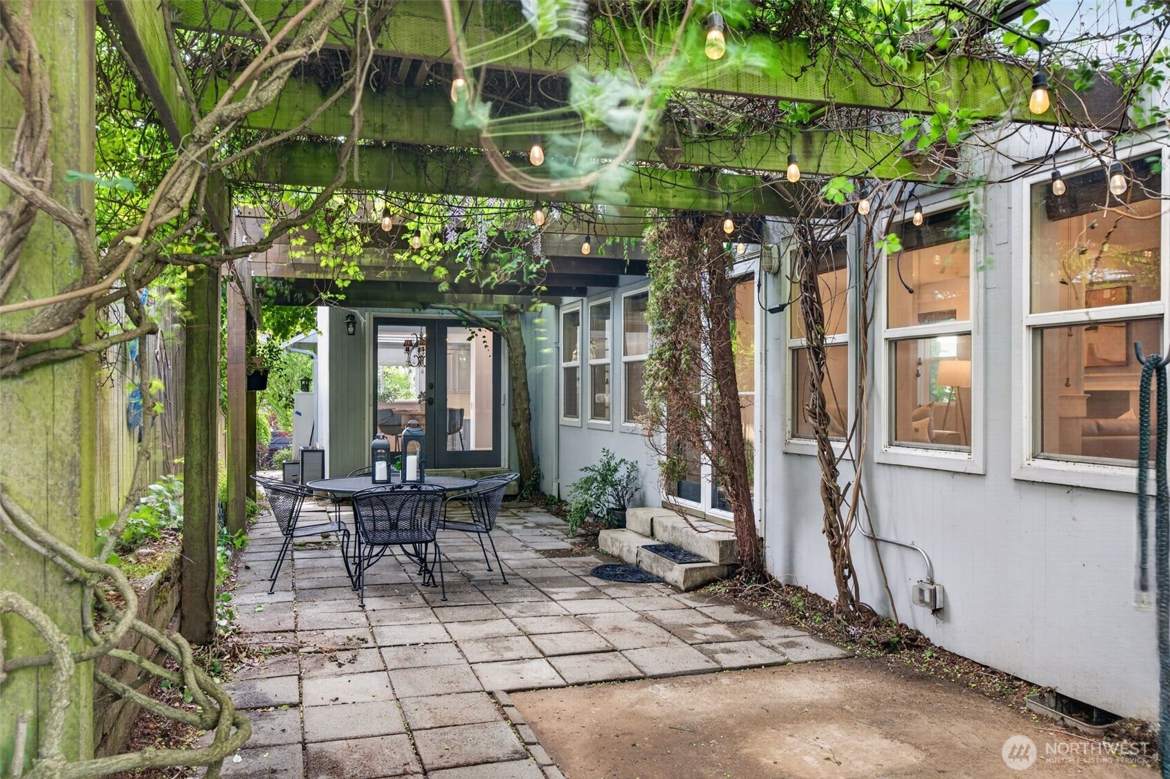 7700 California Avenue Southwest Seattle, WA 98136 - Photo 16 of 40 a view of a building with sitting area