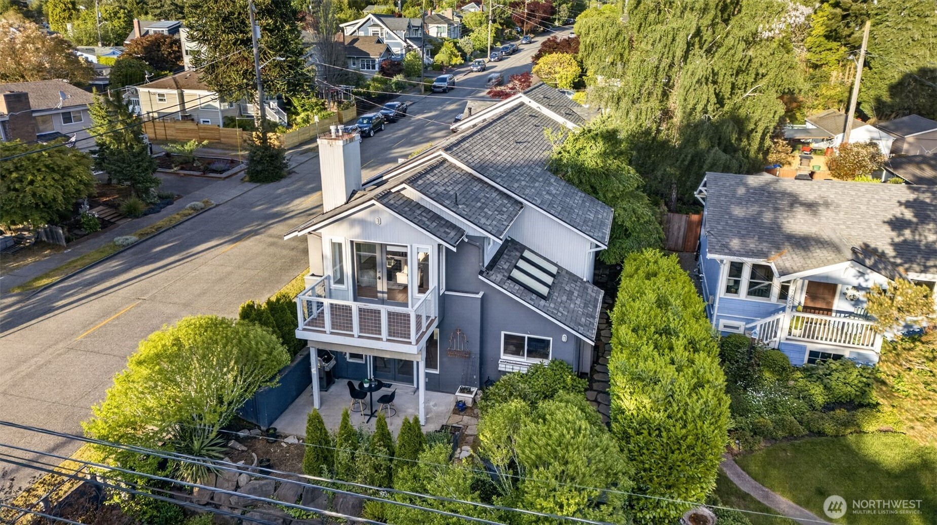 7700 California Avenue Southwest Seattle, WA 98136 - Photo 2 of 40 an aerial view of a house with a yard and potted plants