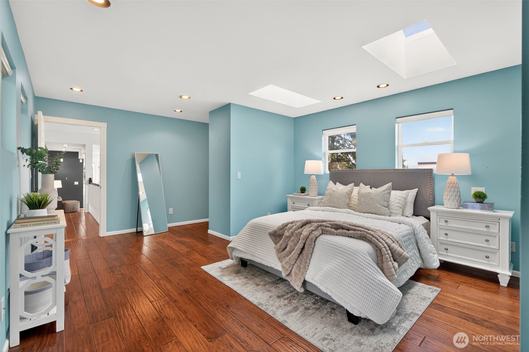 7700 California Avenue Southwest Seattle, WA 98136 - Photo 23 of 40 a bedroom with a bed and a dresser