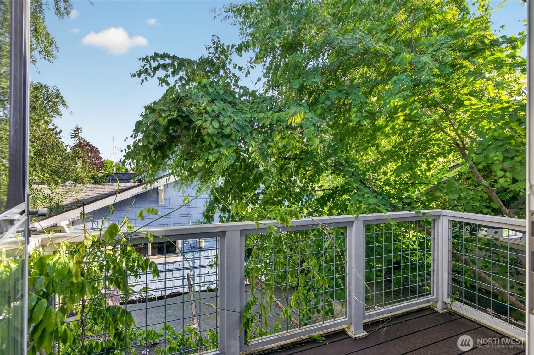 7700 California Avenue Southwest Seattle, WA 98136 - Photo 25 of 40 a house view with a garden space