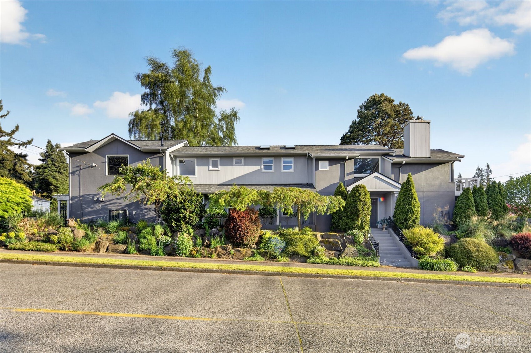 7700 California Avenue Southwest Seattle, WA 98136 - Photo 34 of 40 front view of a house with a small yard