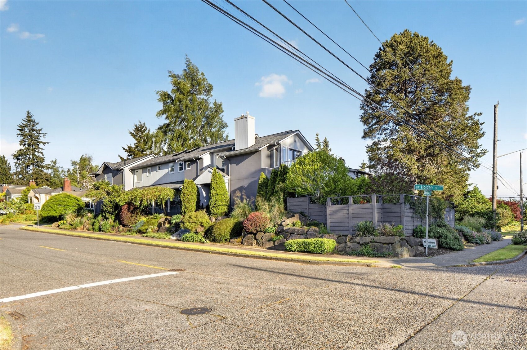 7700 California Avenue Southwest Seattle, WA 98136 - Photo 36 of 40 front view of a house with a street