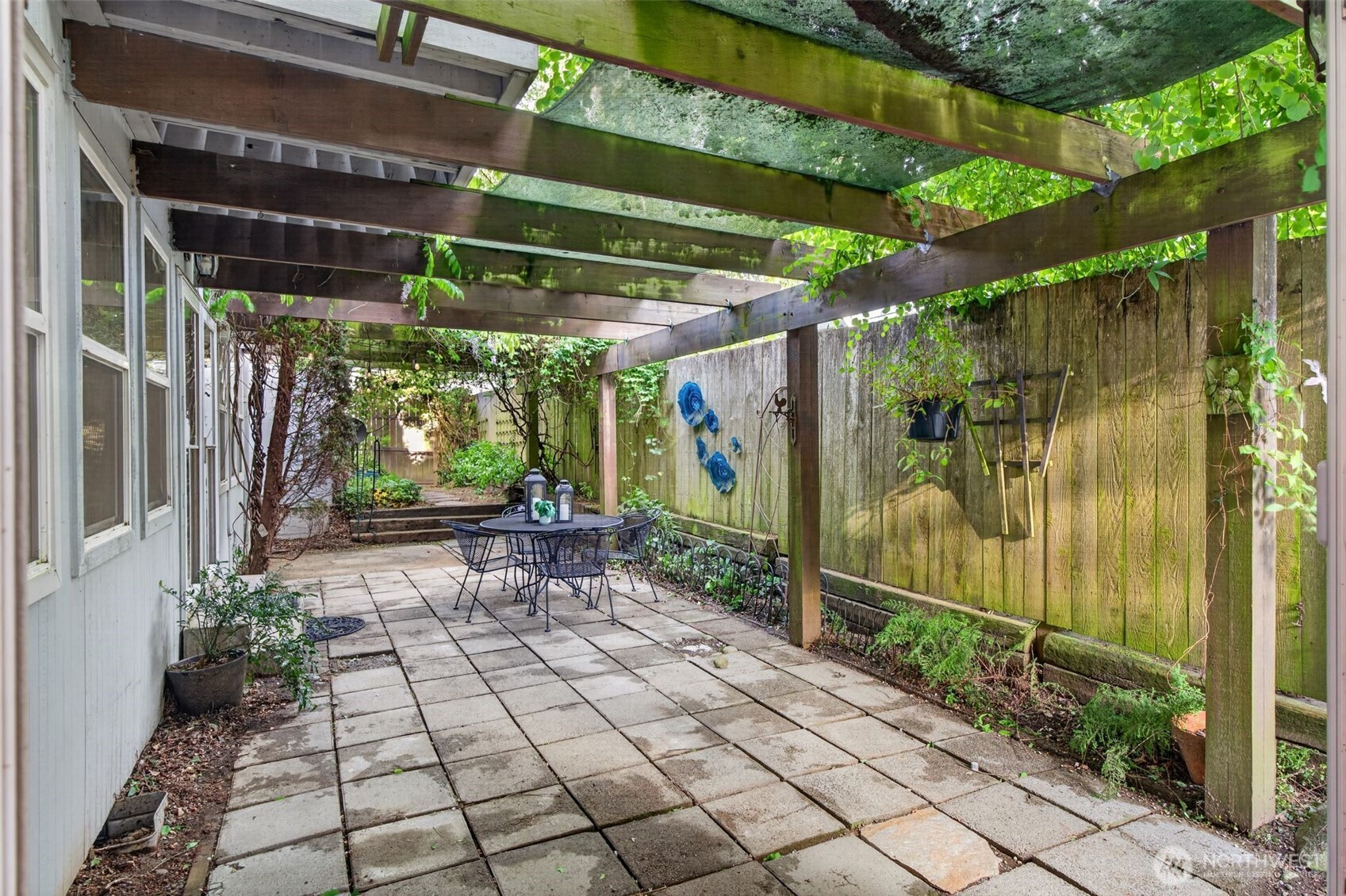 7700 California Avenue Southwest Seattle, WA 98136 - Photo 10 of 40 a view of a pathway with a tree