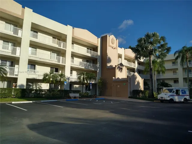 a front view of a building with street view