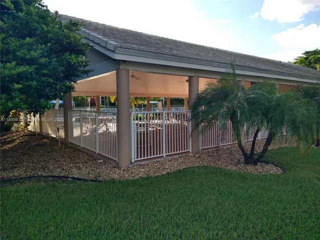 a view of a backyard with a garden