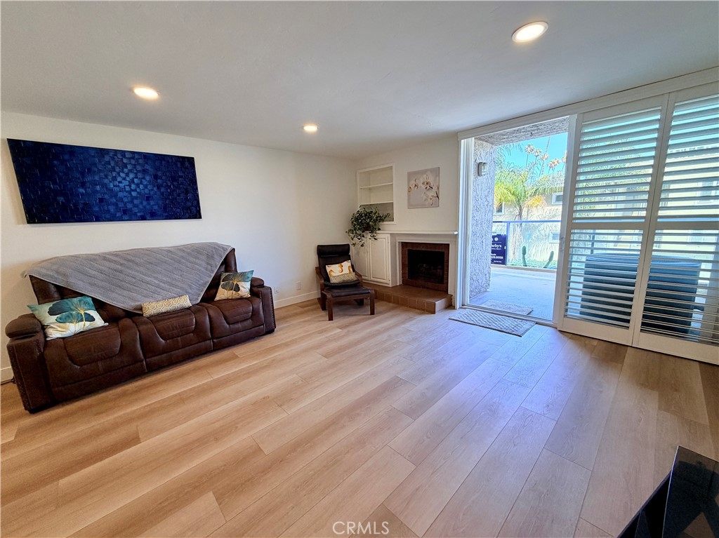 1 3rd Place, Unit 2 Long Beach, CA 90802 - Photo 18 of 70 Very spacious Living Room with Gas Fireplace and a large private patio wioth ocean views!