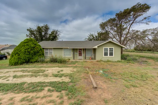 a view of house with outdoor space