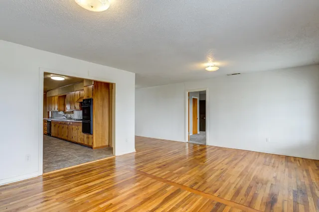 a view of an empty room and window