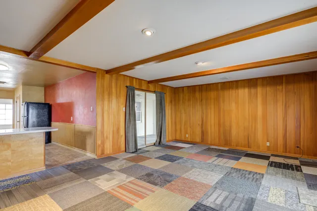 a view of room with window and a yard