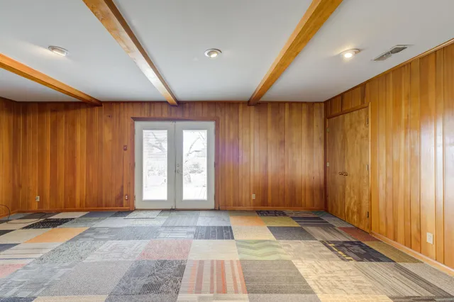a large kitchen with a large window