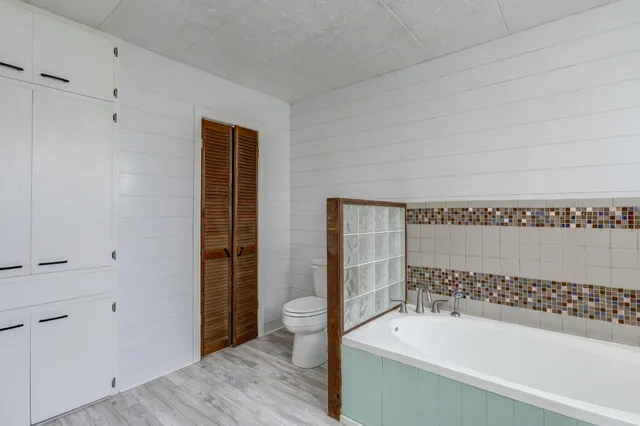 a front view of a house with a white door