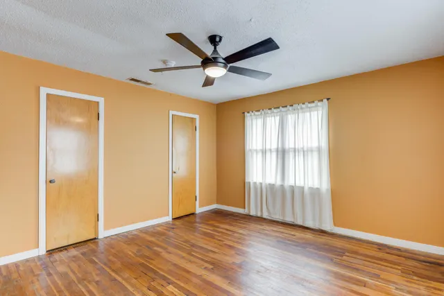 a view of empty room with front door