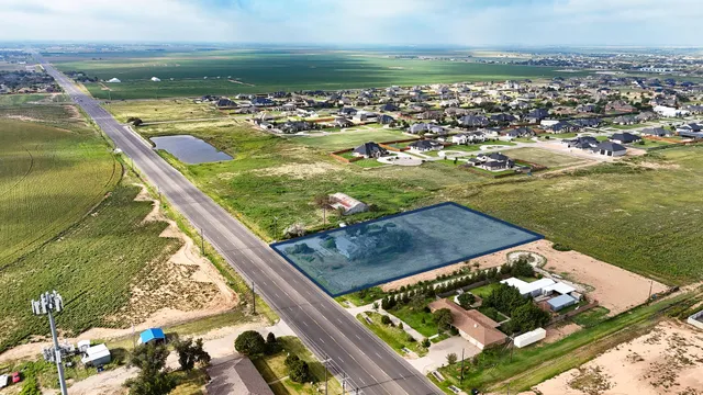 a view of a garden with an outdoor space