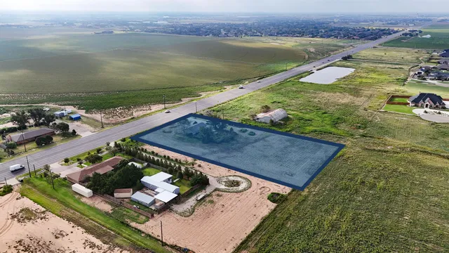 a view of a floor to a building and yard