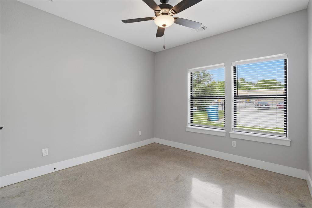 738 East Sears Street Denison, TX 75021 - Photo 23 of 32 an empty room with a window