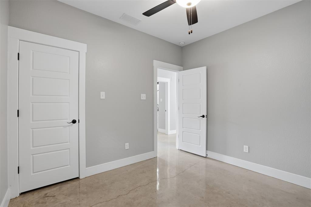 738 East Sears Street Denison, TX 75021 - Photo 28 of 32 an empty room with a bathroom