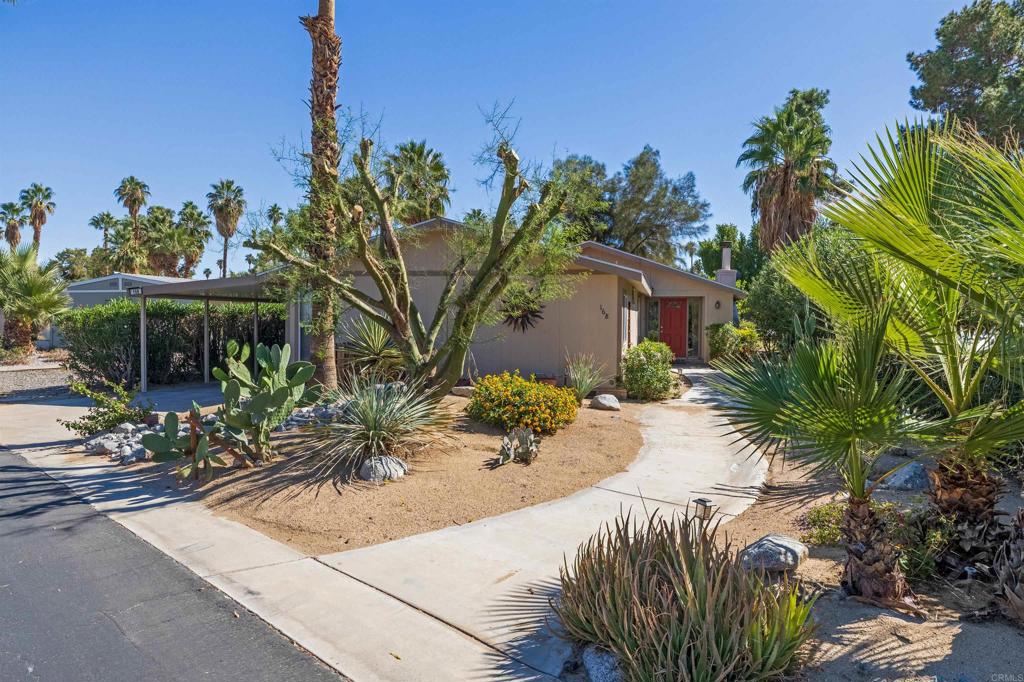 1010 Palm Canyon Drive, Unit 168 Borrego Springs, CA 92004 - Photo 2 of 34 a view of a street with potted plants