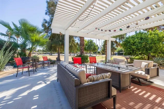 a outdoor living space with furniture and garden view