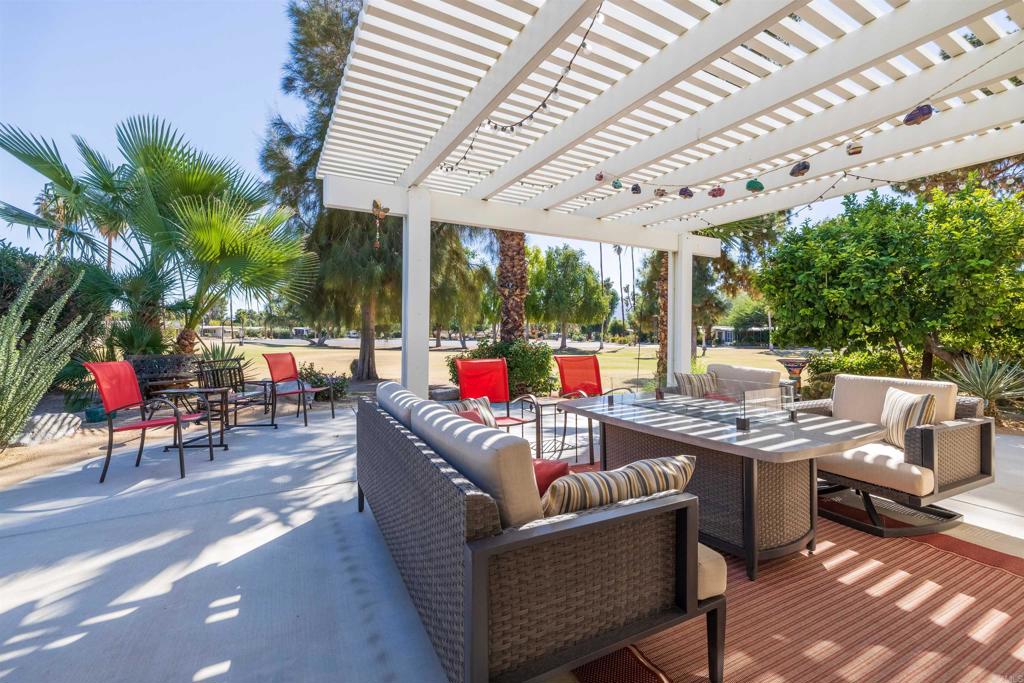1010 Palm Canyon Drive, Unit 168 Borrego Springs, CA 92004 - Photo 24 of 34 a outdoor living space with furniture and garden view