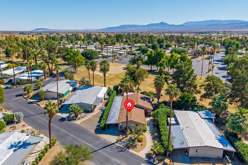 1010 Palm Canyon Drive, Unit 168 Borrego Springs, CA 92004 - Photo 30 of 34 an aerial view of residential houses with outdoor space