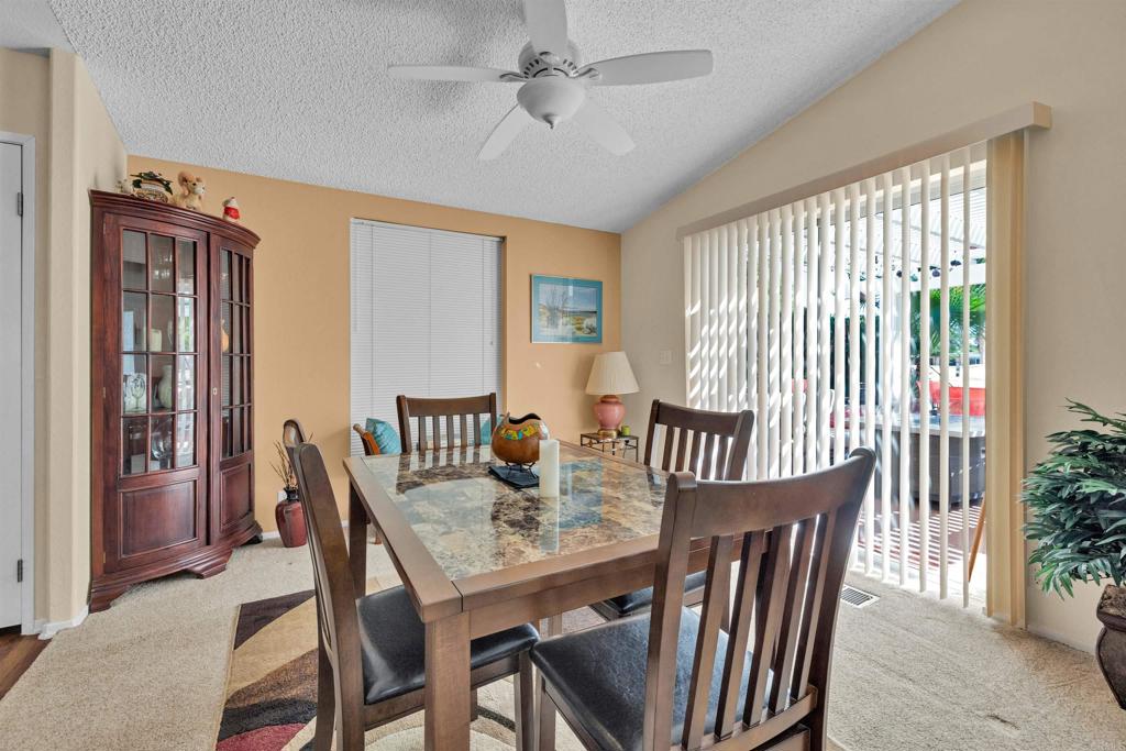 1010 Palm Canyon Drive, Unit 168 Borrego Springs, CA 92004 - Photo 6 of 34 a view of a dining room with furniture window and wooden floor