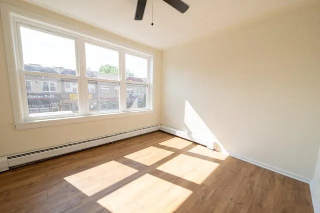a view of an empty room and window