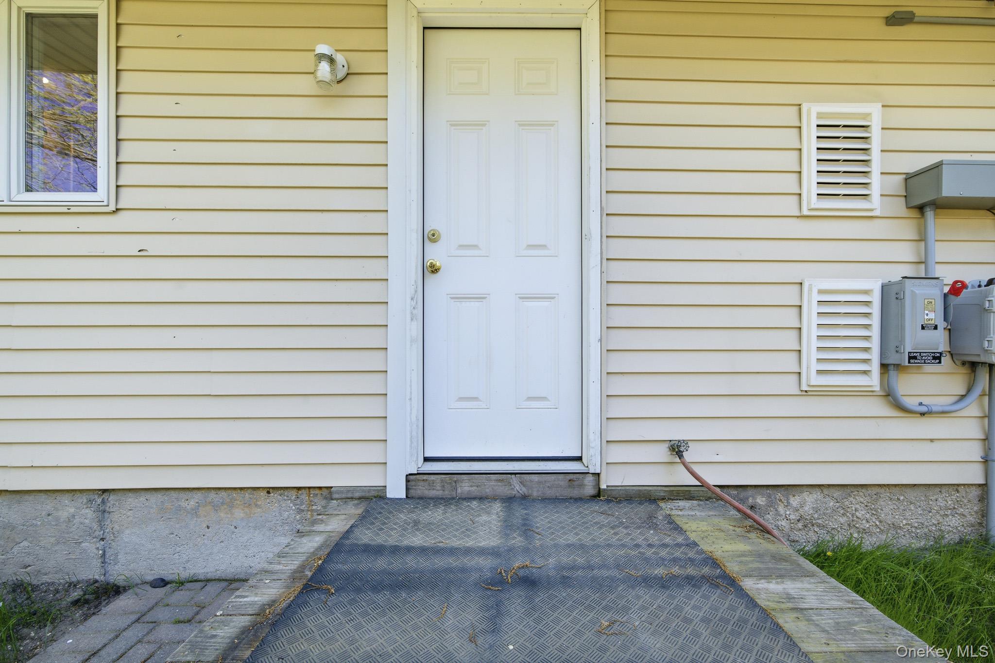 7 Rutland Road Mastic, NY 11950 - Photo 6 of 37 Kitchen Door.
