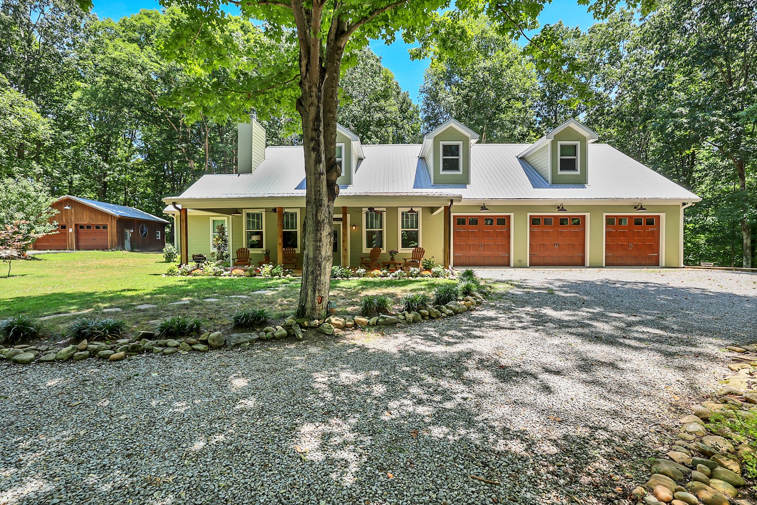 5536 Boy Scout Road Franklin, TN 37064 - Photo 1 of 61 a front view of a house with a garden