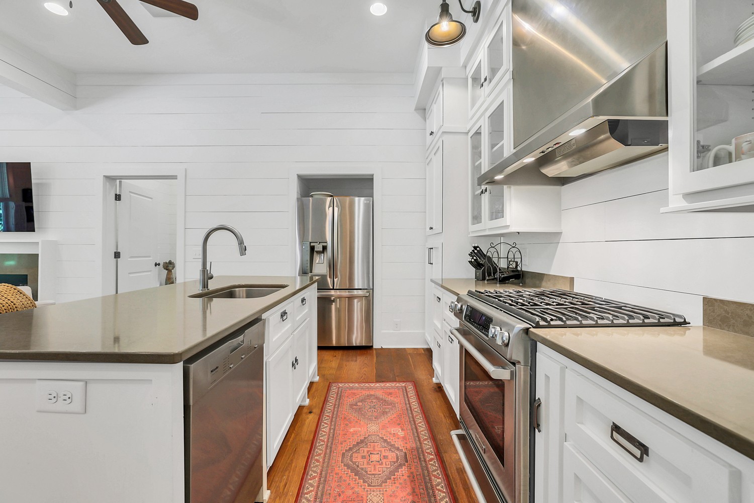 5536 Boy Scout Road Franklin, TN 37064 - Photo 15 of 61 a kitchen with stainless steel appliances granite countertop a sink stove and cabinets