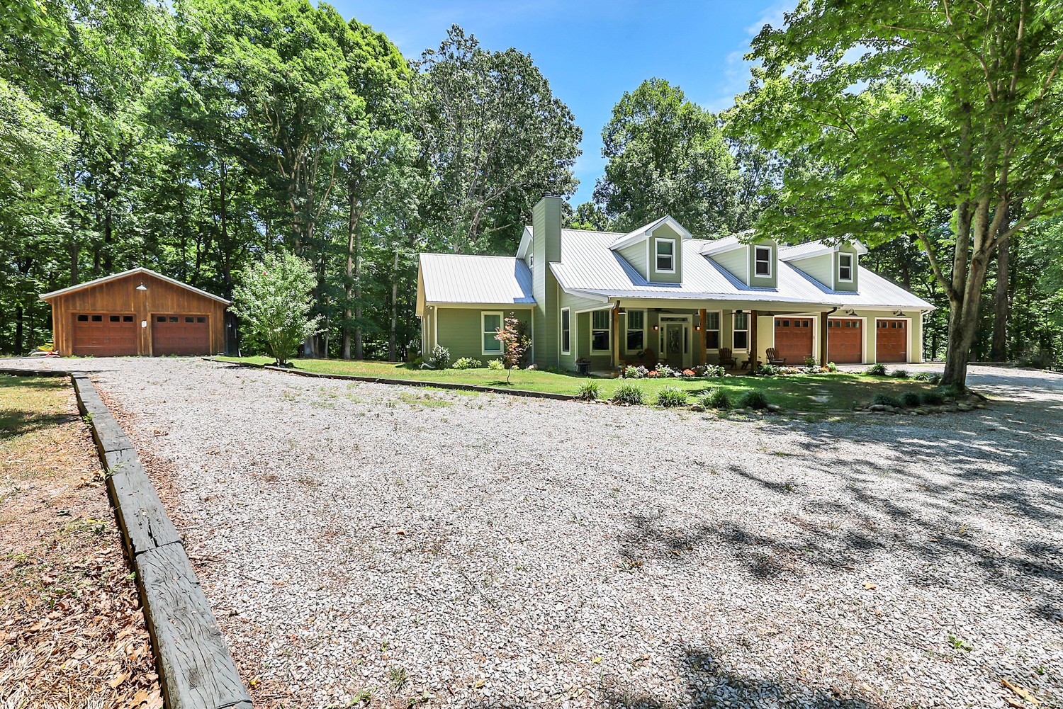 5536 Boy Scout Road Franklin, TN 37064 - Photo 2 of 61 a front view of a house with a yard and trees