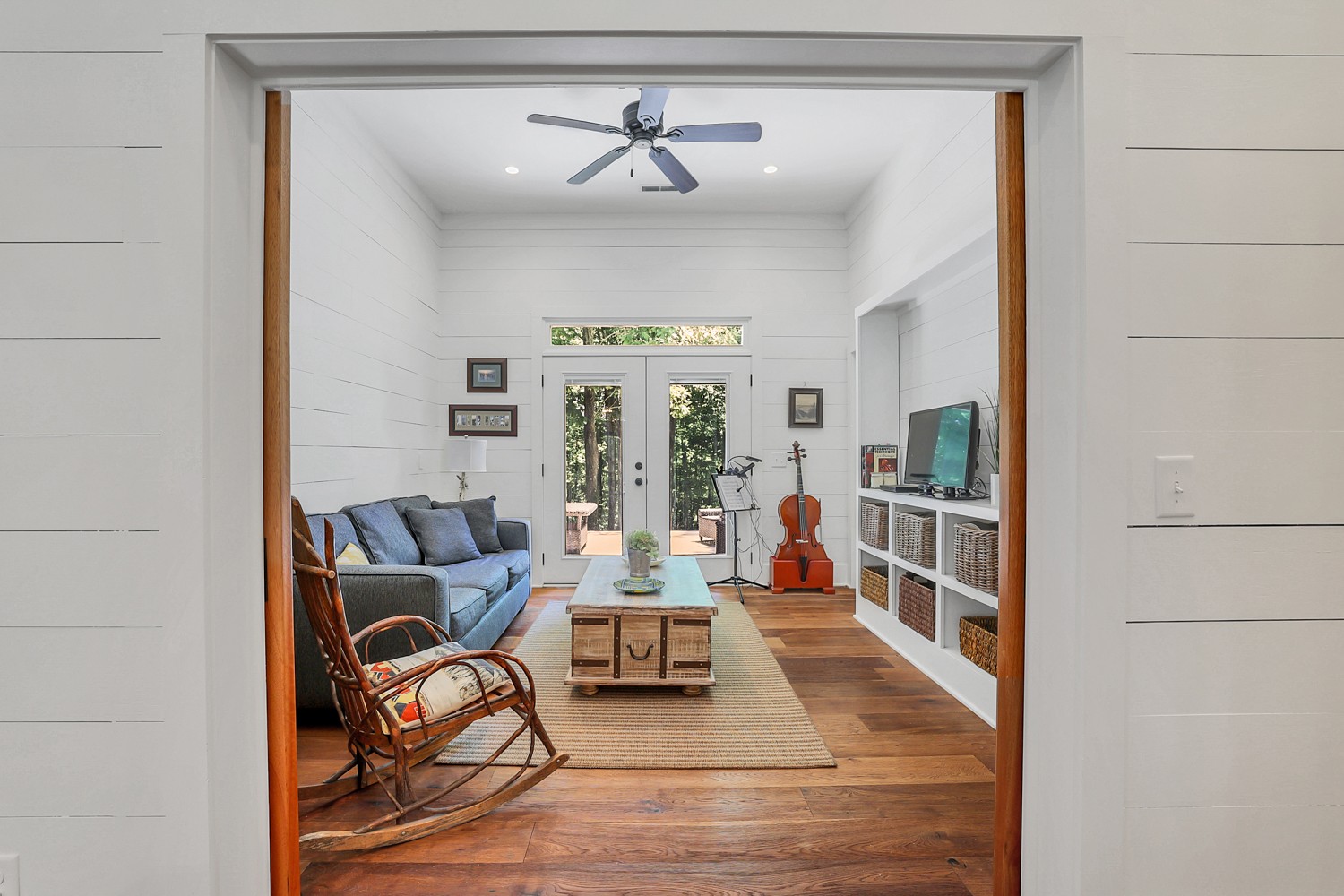 5536 Boy Scout Road Franklin, TN 37064 - Photo 21 of 61 a living room with furniture a rug and a chandelier