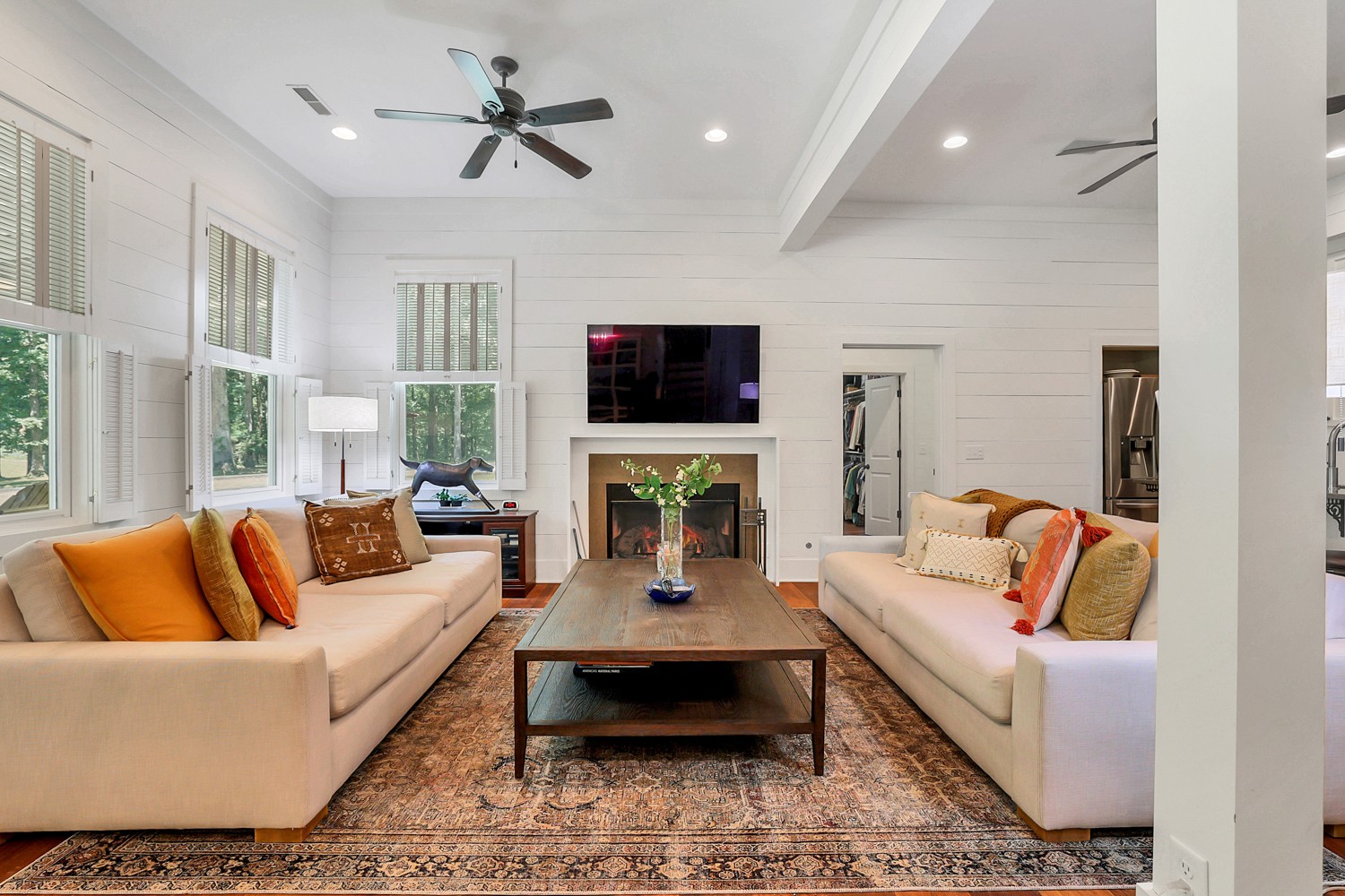 5536 Boy Scout Road Franklin, TN 37064 - Photo 10 of 61 a living room with furniture a flat screen tv and a fireplace