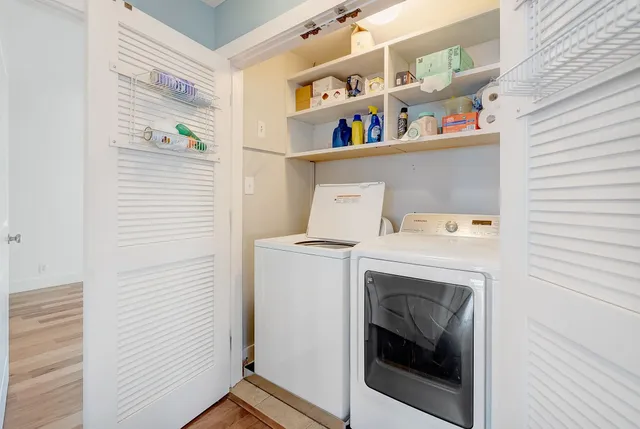 a utility room with dryer and washer