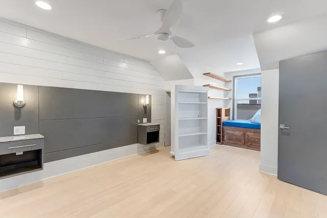 a bathroom with a sink and a large mirror
