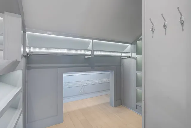 a view of an empty walk in closet