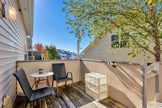 a view of a chairs and table on the terrace