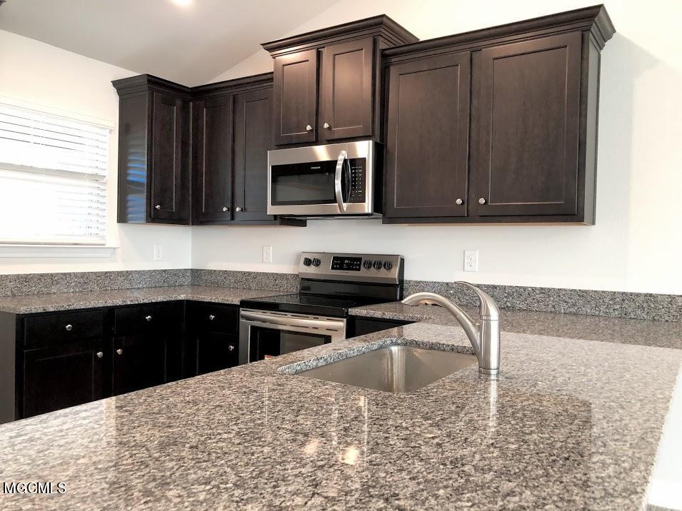 Kitchen with granite countertops