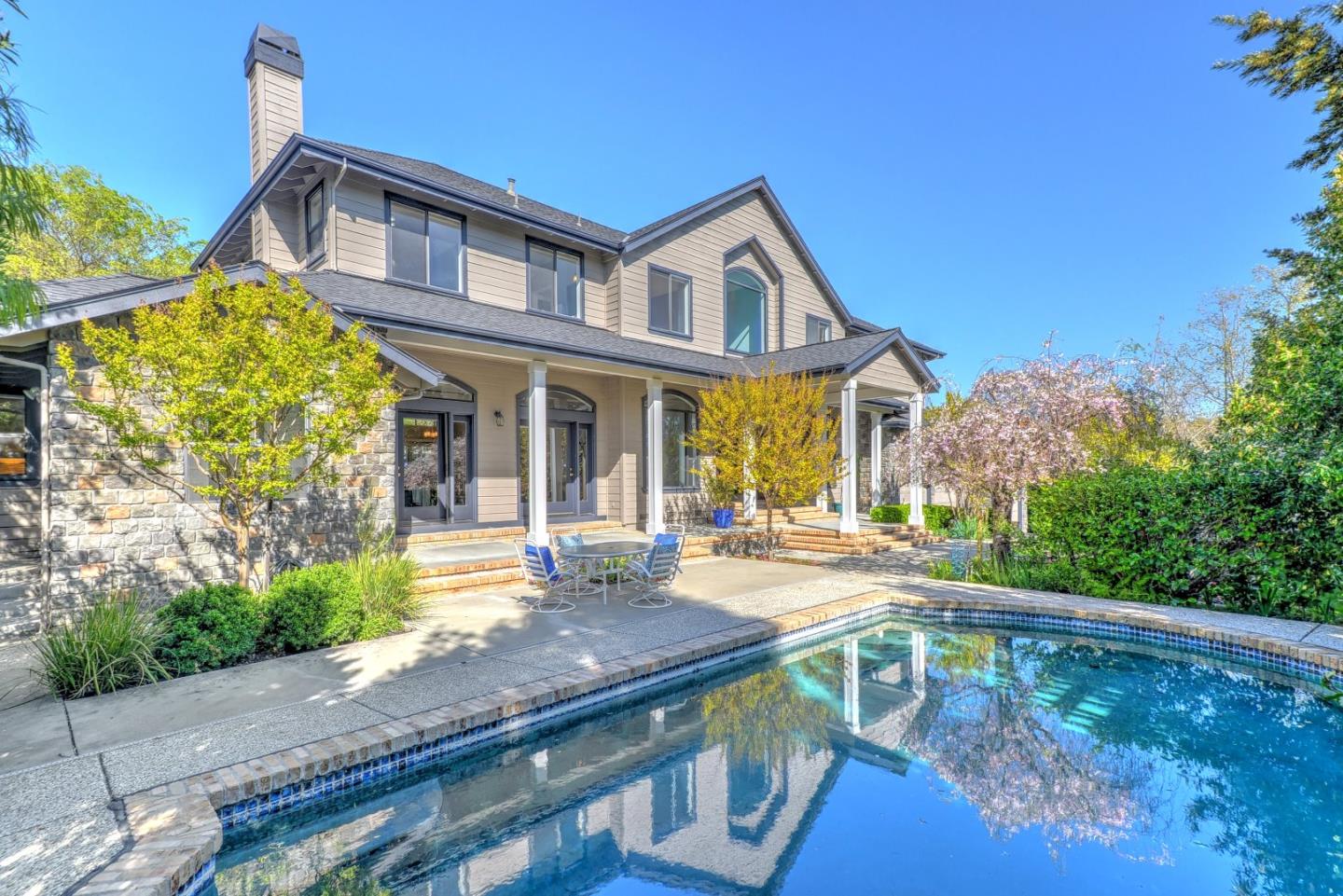 6802 Graystone Lane San Jose, CA 95120 - Photo 1 of 38 a view of house that has a lot of windows on it