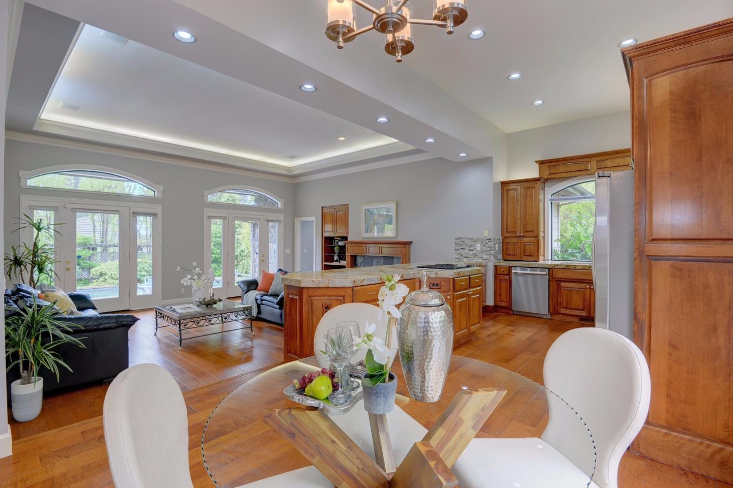 6802 Graystone Lane San Jose, CA 95120 - Photo 13 of 38 a living room with furniture kitchen view and a large window