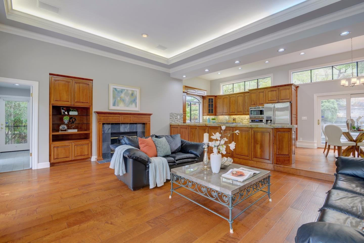 6802 Graystone Lane San Jose, CA 95120 - Photo 16 of 38 a living room with furniture and a fireplace