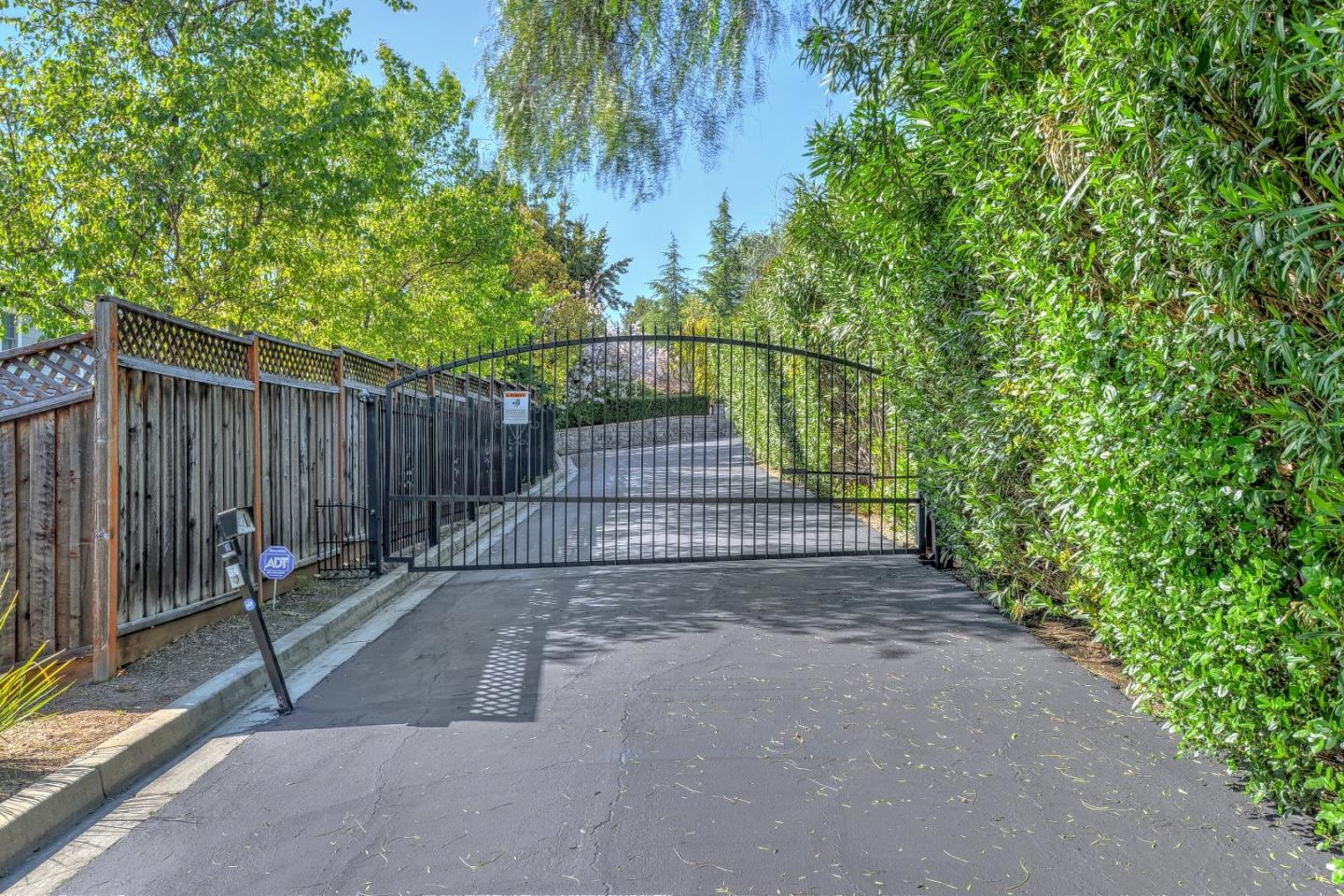 6802 Graystone Lane San Jose, CA 95120 - Photo 2 of 38 a view of pathway along with wooden fence