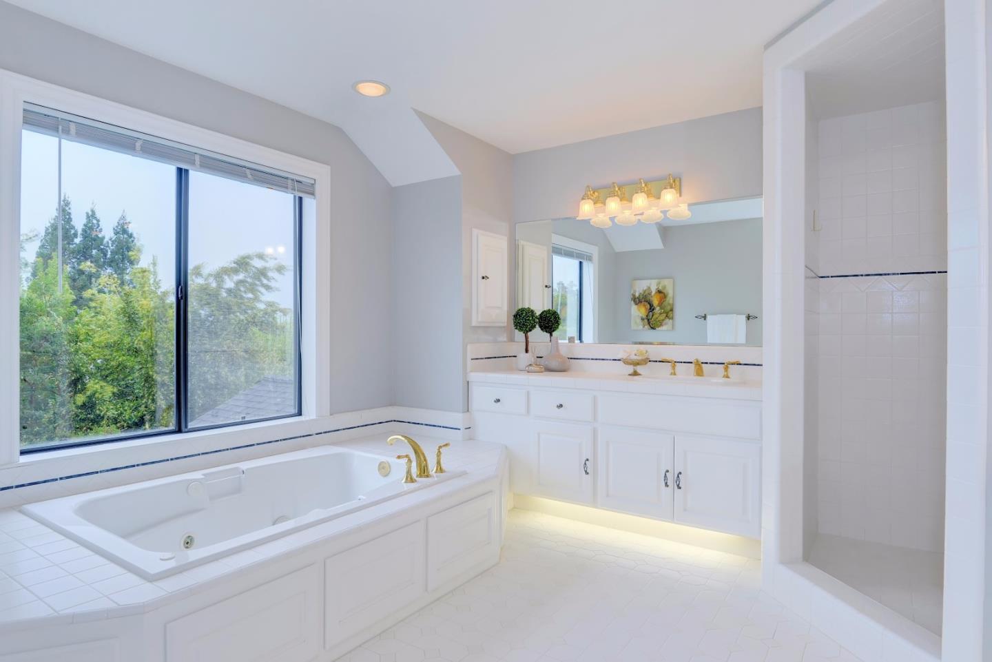 6802 Graystone Lane San Jose, CA 95120 - Photo 21 of 38 a bathroom with a bathtub and a sink