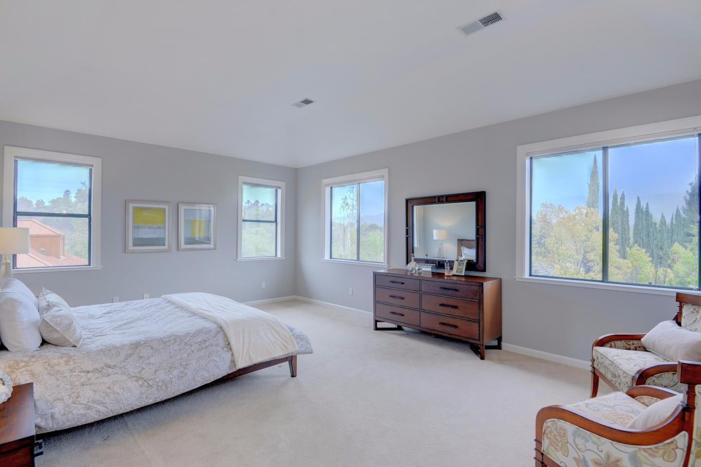 6802 Graystone Lane San Jose, CA 95120 - Photo 24 of 38 a bedroom with a bed and a couch