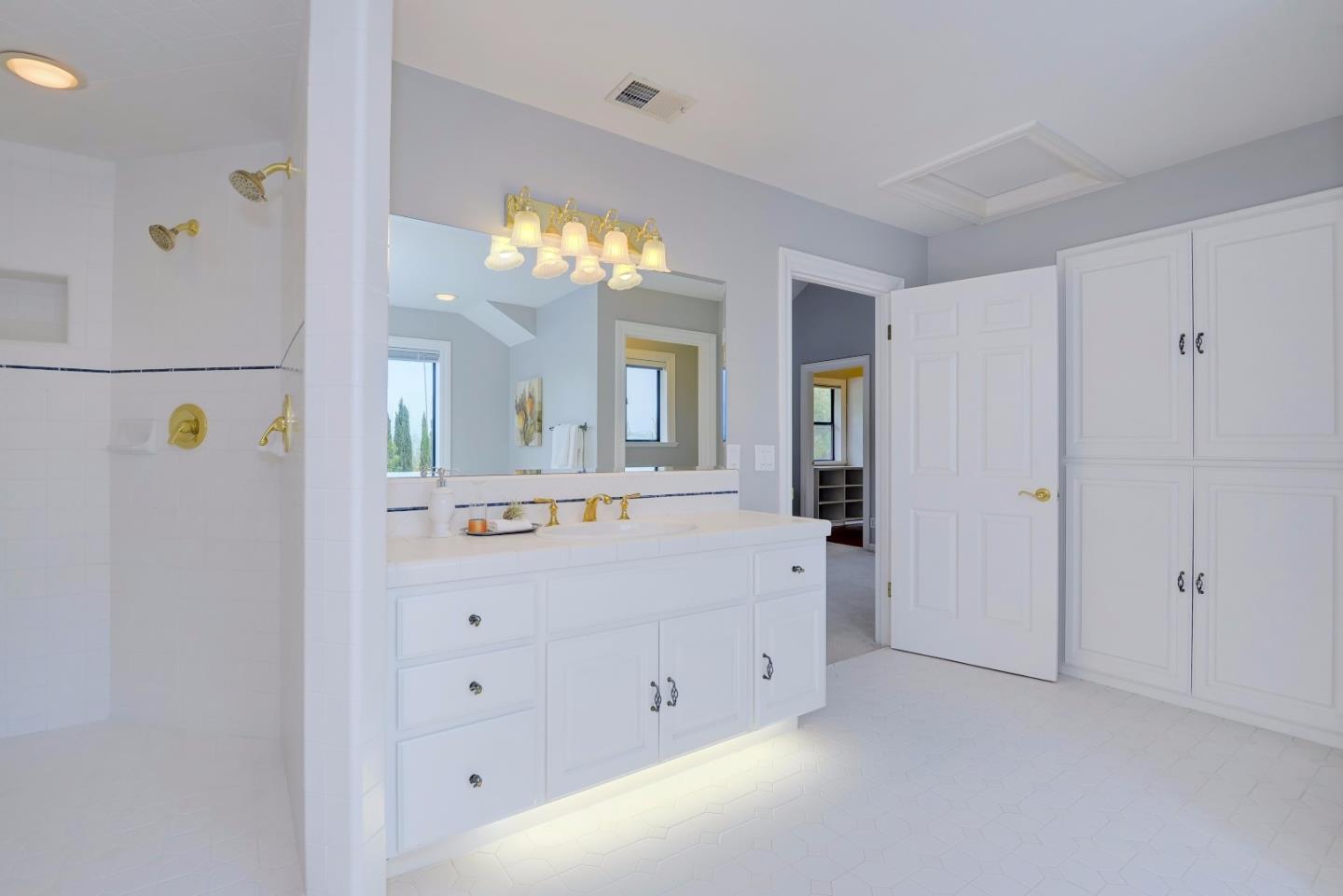 6802 Graystone Lane San Jose, CA 95120 - Photo 27 of 38 a view of a bathroom with mirror