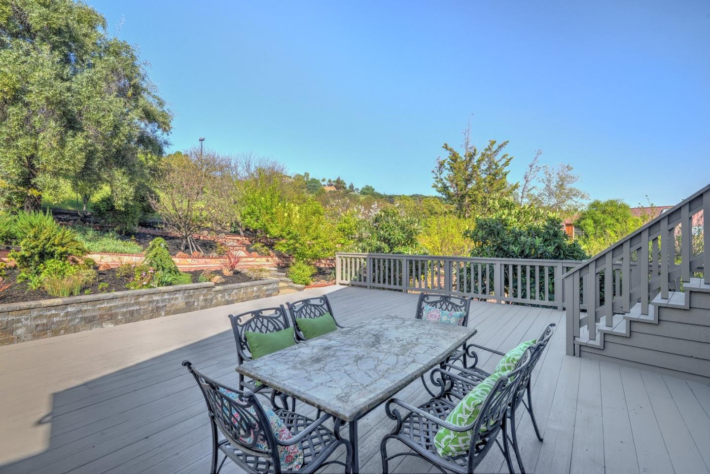 6802 Graystone Lane San Jose, CA 95120 - Photo 36 of 38 a view of balcony with table and chairs and wooden fence